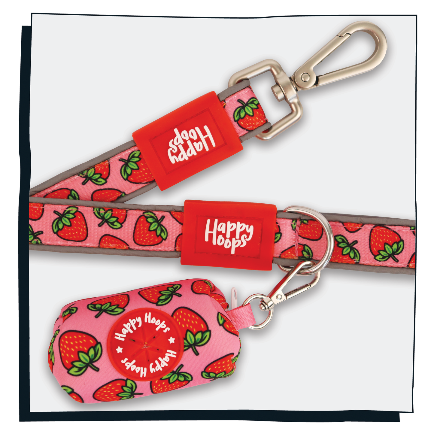 Happy Hoops 'Strawbabe' poop bag dispenser with pink and red strawberry pattern on Stawbabe lead