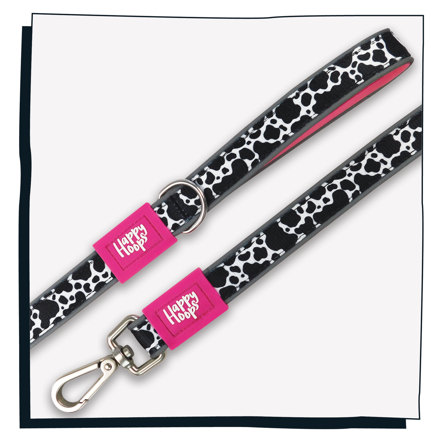 Aerial view of pink Happy Hoops dog lead with funky cow print design with plush pink neoprene padding, reflective strips, robust 360 degree metal rotating clasp and rust proof stainless steel D-ring.