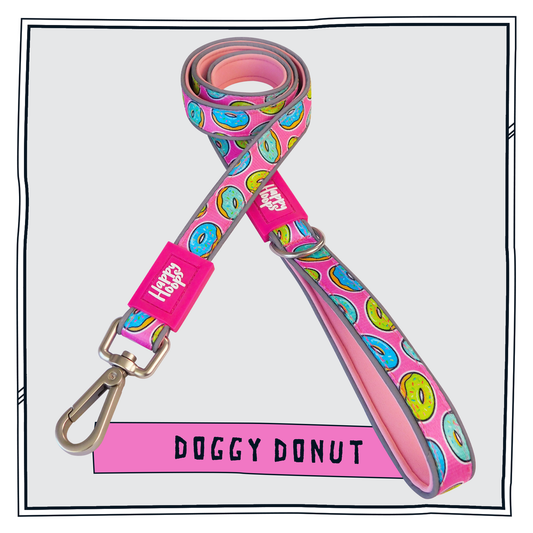 Pink Happy Hoops dog lead with funky donut print design with plush pink neoprene padding, reflective strips, robust 360 degree metal rotating clasp and rust proof stainless steel D-ring.